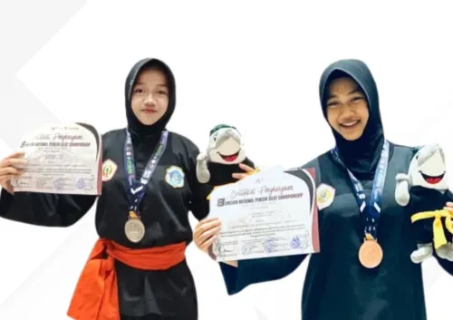 DUA SRIKANDI SMP NEGERI 1 SUGIO TOREHKAN PRESTASI NASIONAL PADA KEJUARAAN PENCAK SILAT UMSURA CHAMPIONSHIP 2026